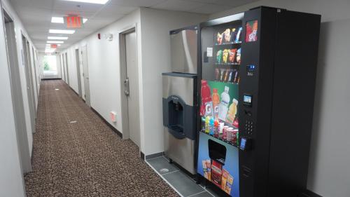 a corridor with a vending machine in a hallway at Sleep Inn Franklin - Cool Springs in Franklin