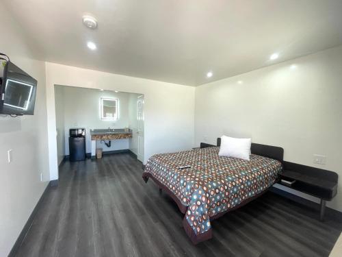 Katil atau katil-katil dalam bilik di Newport Bay Inn