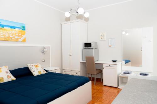Kuchyň nebo kuchyňský kout v ubytování Le Stanze di Lucia vicino Ospedale Cardinale Panico a Tricase