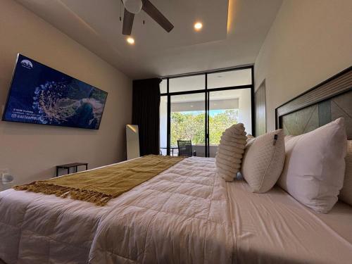 Una cama o camas en una habitación de Beautiful Villa 3BR Private pool and Jacuzzi