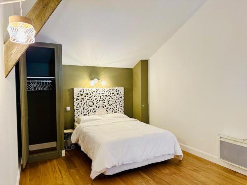 Ένα ή περισσότερα κρεβάτια σε δωμάτιο στο Duplex T2 de haut-standing
