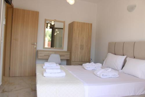 Ένα ή περισσότερα κρεβάτια σε δωμάτιο στο Luxury Villa John