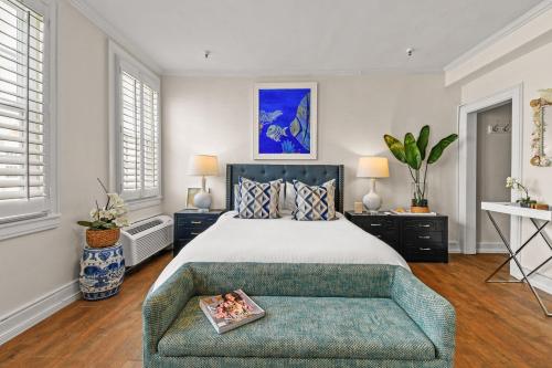 Ένα ή περισσότερα κρεβάτια σε δωμάτιο στο Tropicals of Palm Beach