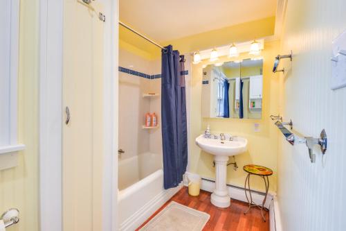 a bathroom with a sink and a shower and a toilet at Walk to St Lawrence River Clayton Apt with Porch! in Clayton