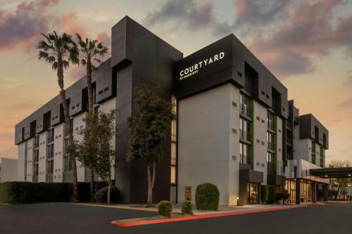 a rendering of a rendering of the courtyard hotel at Courtyard San Jose Airport in San Jose