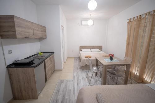 Кровать или кровати в номере Luna Apartments Gevgelija