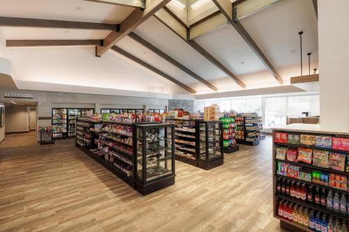 a store with several shelves filled with products at Little America Hotel - Wyoming in Little America