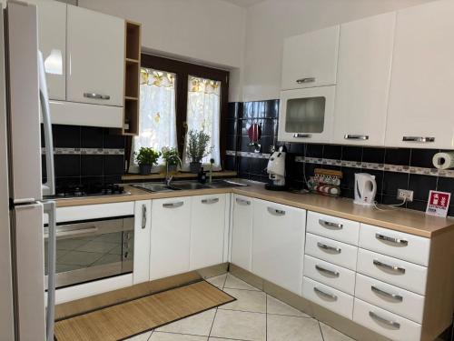 Η κουζίνα ή μικρή κουζίνα στο Paola's House