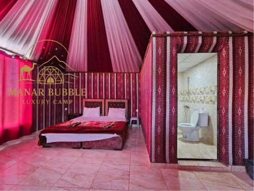Ένα ή περισσότερα κρεβάτια σε δωμάτιο στο Manar Bubbel Luxury Camp