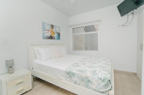 Apartamentos Ganesha Jacóにあるベッド
