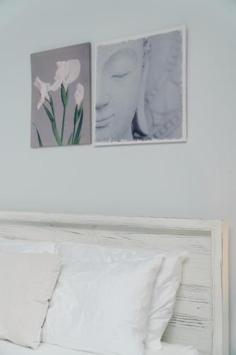 Apartamentos Ganesha Jacóにあるベッド