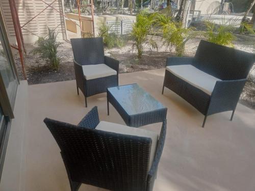 Chic apartment in Aldea Mayab with Lagoon access and private splash poolにあるシーティングエリア