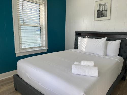 The Vibes Hotel, Trademark Collection by Wyndhamにあるベッド
