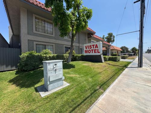 a usa motel sign in front of a house at Vista Motel - Riverside in Riverside