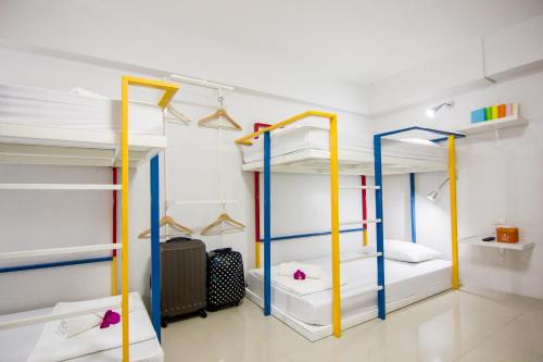 Regent Ngamwongwan Hotelにあるベッド