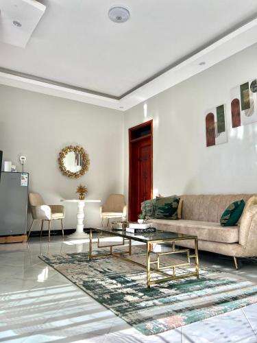 Ein Sitzbereich in der Unterkunft The Green Apartment