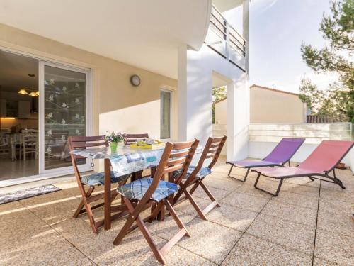 Appartement Calme Proche Plage avec Terrasse Sud, Parking Sécurisé et Équipements Complets - FR-1-306-909