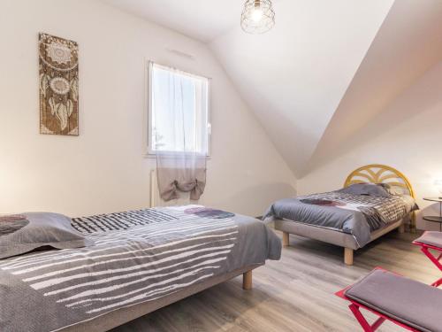 Postel nebo postele na pokoji v ubytování Maison moderne à 100m de la mer avec jardin clos, garage, WiFi, proche camping avec commerces, animaux OK - FR-1-306-1205