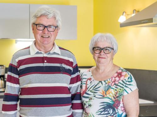 an older man and woman standing next to each other at Gîte cosy à Vertou, près de Nantes, avec Wi-Fi et espace extérieur - FR-1-306-1217 in Vertou