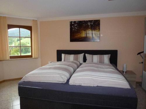 En eller flere senge i et værelse på modernly furnished holiday apartment