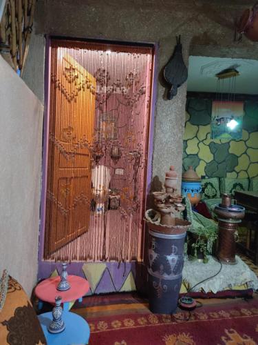 a room with a window with a bunch of items at Château Berbère Madame DELLAL in Taroudant