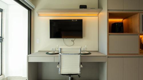 TV a/nebo společenská místnost v ubytování Alto Madalena - Studios de luxo com piscina panorâmica