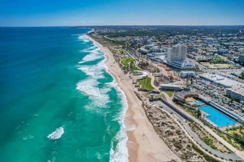 an aerial view of a beach and the ocean at Coastal Retreat in Scarborough in Perth