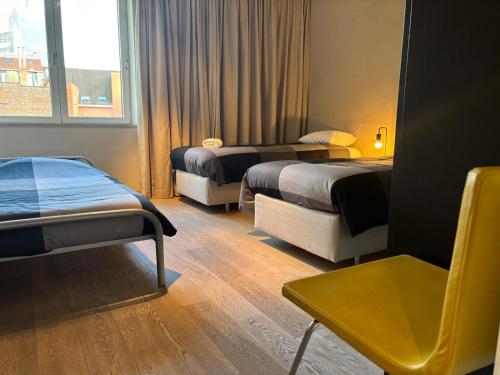 Ένα ή περισσότερα κρεβάτια σε δωμάτιο στο Charming apartment in the Heart of Brussels