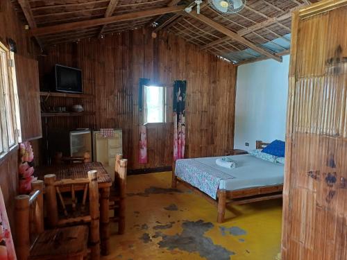 Postel nebo postele na pokoji v ubytování Livio's loading house