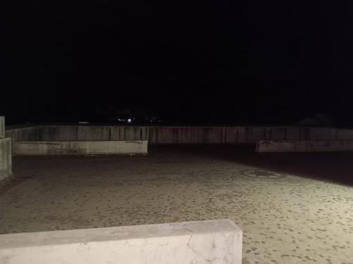 a night time view of an empty area of a building at The Urban Escape in Trimbak