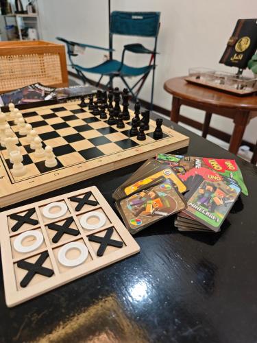 a table with a chess board and a game at D Banyan Homestay, Bukit Banyan in Sungai Petani