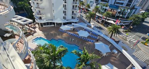 an overhead view of a swimming pool at a hotel at Broadbeach Holiday Apartments in Gold Coast