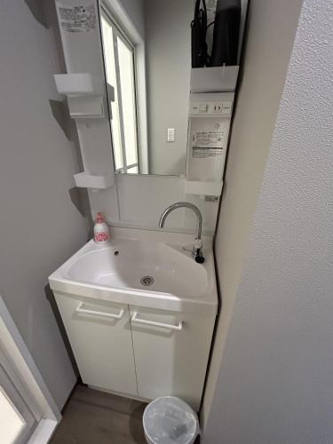 Un baño de ゲストハウス長浜