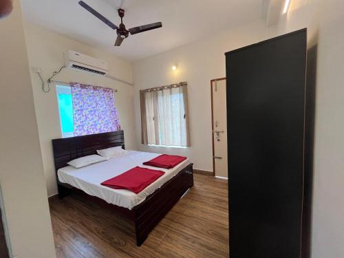 Cama o camas de una habitación en Sri Adhinath Residency