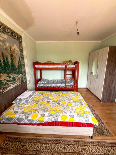 Una cama o camas en una habitación de Guest House Choi-Tal