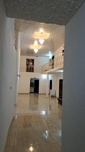 a large room with a lobby with a large floor at Luxe lagoon guest house in Kasongha