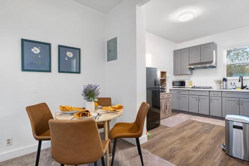 a kitchen and dining room with a table and chairs at 475 Unit 3 Stunning Private 1B unit Kingsize bed &sofa bed AC in San Jose
