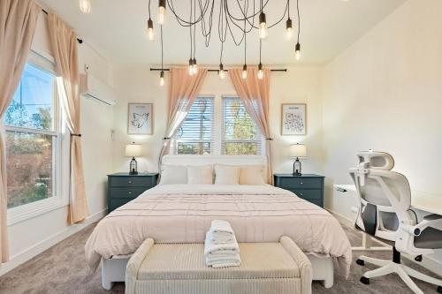 a large bedroom with a large bed and a chair at 475 Unit 3 Stunning Private 1B unit Kingsize bed &sofa bed AC in San Jose