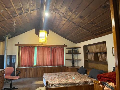 a bedroom with a large bed in a room at Ananda grham in Kotla