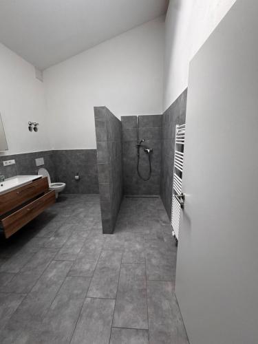 Ein Bett oder Betten in einem Zimmer der Unterkunft Steinhöring Bade Appartements