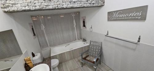 Ένα μπάνιο στο Oh So You Guesthouse