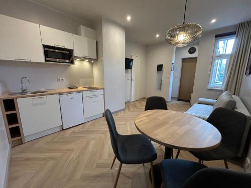 Una cocina o zona de cocina en Jon`s Apartments