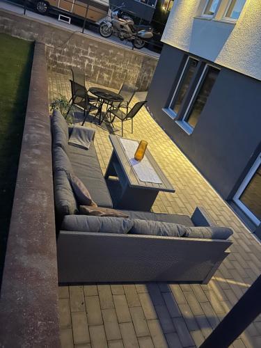 an overhead view of a couch and table on a patio at Villa Skoglund in Ulricehamn