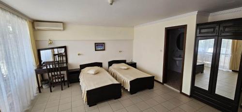 Postel nebo postele na pokoji v ubytování Hotel Klisura