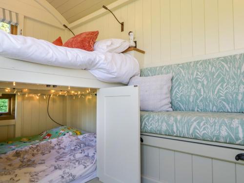 two bunk beds in a tiny house at Hazel in Witney