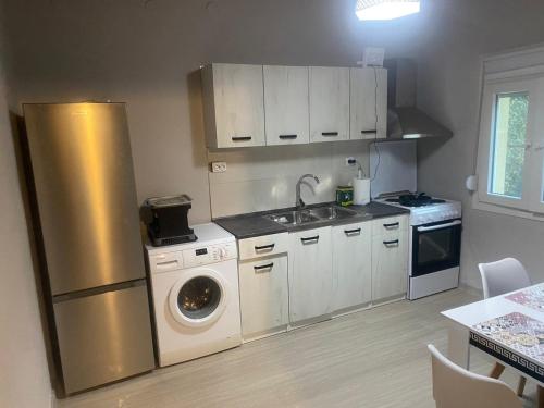 Kuchyň nebo kuchyňský kout v ubytování Olive Green House