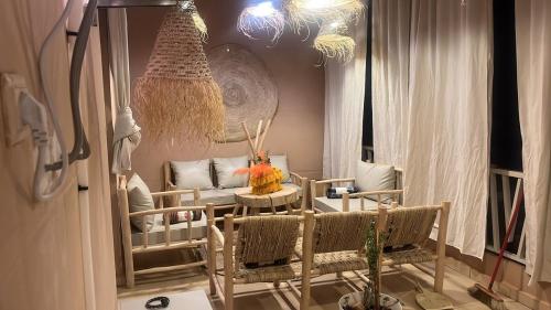 Posezení v ubytování Appartement avec terrasse XXL