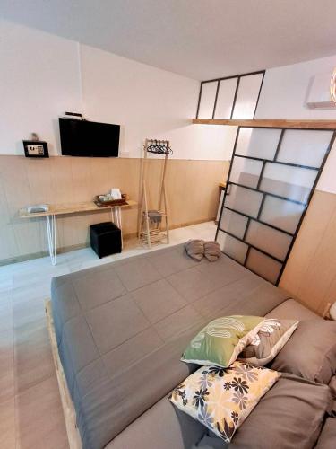 a bedroom with a large bed in a room at Seasmile kohlarn in Ko Larn