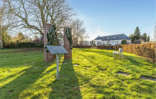 a sign in the middle of a grass field at Stunning Home In Wagenborgen With Wifi in Wagenborgen