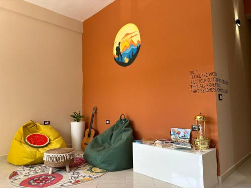 Postel nebo postele na pokoji v ubytování Queen-V Hostel